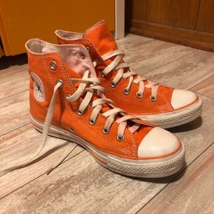 Orange women’s high-top Converse